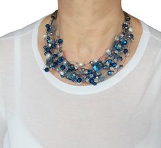 Bold statement blue necklace with various crystals and pearls. It has lovely airy feel and will be an eye-catch for a party, function or a wedding. This bridal necklace is comfortably sitting on the collar bone and the length is about 19" (adjustable). One-of-a-Kind piece. Handmade in Canada. Elegant Blue Crystal Necklaces For Parties, Elegant Blue Crystal Necklace For Party, Blue Pearl Jewelry For Party, Party Pearl Jewelry In Blue, Blue Pearl Beaded Necklace For Party, Blue Crystal Beaded Necklace For Party, Blue Crystal Beaded Necklaces For Party, Elegant Blue Pearl Beaded Necklaces, Elegant Blue Beaded Pearl Necklace