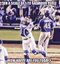 an image of a baseball player that is jumping in the air with his hands up