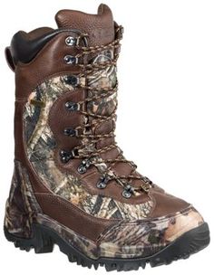 a pair of brown boots with camo on them