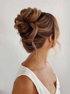 Bridesmaid Hairstyles Bun Top Knot, Asymmetrical Updo Wedding, Maternity Updo Hairstyles, Bridal Updos For Round Faces, Wedding Updo With Fringe, Bridesmaid Hairstyles Dark Hair Updo, Retro Updo Wedding, Fancy Hair Updos Classy, Wedding Hair Updo Long Hair