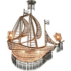 a chandelier that has a boat on it with lights hanging from the bottom