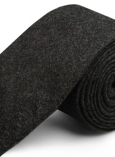 This pure wool Tweed Tie has been hand crafted with premium finish. 
 
 This tie would compliment your suits or blazers and will stand out with it's solid finish. 
 
 A must have for your neckwear collection that you won't find anywhere else. 
 
 Width at widest : 2.75 inches. Hand Crafted, Pure Products, Wool, Hamburg