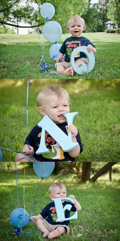 a little boy sitting in the grass with balloons and a letter that says i love you