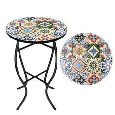 two tables with colorful designs on them and one has a black metal frame, the other is