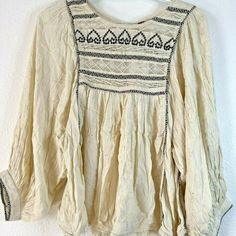 Free People Cyprus Avenue Boho Peasant Top With 3/4 Balloon Sleeve Chevrons & Eyelet Stitch Accents New With Tags Features Beautiful Eyelet Embroidery Front And Back With Different Visual Textures And Accent Piping In A Chevron Pattern. Of Course, You Must Note The Gorgeous Black Eyelet Embroidered Pattern Across The Neckline/Chest Area Giving It Almost A Jeweled Appearance. A Fringed Hemline Offers Texture And Adds To The Casual, Soft Appearance Of This Top. The Blend Of 99% Viscose (Rayon) & 1 Spring Festival Beige Peasant Top, Beige Cotton Peasant Top, Cream Long Sleeve Bohemian Top, Long Sleeve Beige Blouse For Festival, Beige Long Sleeve Folk Top, Beige Folk Style Long Sleeve Tops, Beige Long Sleeve Cotton Peasant Top, Cream Long Sleeve Festival Blouse, Cream Long Sleeve Peasant Top For Fall