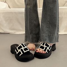 Looking for a pair of women's platform slides? I got you covered! These platform slides are the perfect combination of style and comfort. With their peep toe design and wedge heel, they're ideal for a vacation or casual everyday wear. The black and white woven pattern adds a trendy touch, while the round head and thick sole provide extra support. These casual everyday slippers are a must-have for any fashion-forward woman. Whether you're strolling along the beach or running errands, these platfo Casual Open Toe Platform Slippers With Chunky Platform, Black Chunky Platform Clogs For Summer, Comfortable Open Toe Platform Slides, Comfortable Slide Wedge Sandals With Platform, Comfortable Wedge Sandals With Platform, Comfortable Platform Slide Wedge Sandals, Platform Slides With Round Toe In Eva, Beach Slides With Thick Synthetic Sole, Open Toe Slides With Chunky Platform