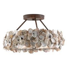 a light fixture with shells on it