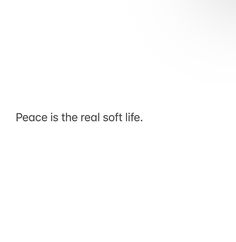 a white wall with the words peace is the real soft life