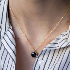 Dainty black onyx necklace in 14K solid gold. Simple and dainty necklace for women who love colors. The best gift for her. 100% handcrafted with love! PRODUCT DETAILS ● Material: 14K solid gold - white gold - rose gold ● Gemstone: Black onyx, round briolette cut ● Stone Diameter: 10mm (0.4in) ● Length: 39cm (15.5in) to 45cm (17.5) HOW TO ORDER - CUSTOM ORDERS ●Choose from the drop down menus the available options (Metal, Length) and leave us a note for any special requirements. ●For special orde Elegant Black Necklaces With Adjustable Chain, Elegant Gold Plated Round Birthstone Necklace, Elegant Everyday Onyx Jewelry, Elegant Onyx Jewelry For Everyday, Elegant Black Jewelry With Adjustable Chain, Black Gold Plated Charm Necklace With Adjustable Chain, Elegant Black Gemstone Necklace, Chic Black Round Jewelry, Classic Black Clavicle Necklace