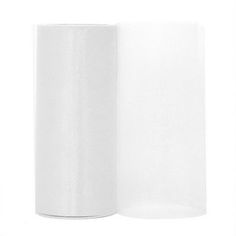 a roll of white paper sitting on top of a table