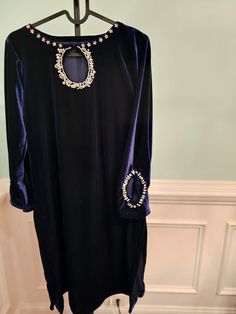 Beautiful blue Velvet handwork pearl dress embroidered dress with fine beads and pearls to embellish the dress. For party wear and special occasions. Comes along with customized bottom if requested Elegant Velvet Salwar Kameez For Festive Occasions, Elegant Velvet Dress With Dabka Work, Blue Traditional Drape Dress For Celebration, Elegant Unstitched Velvet Dress, Diwali Unstitched Hand Embellished Dress, Elegant Kurta For Diwali Celebration, Elegant Formal Dresses For Festivals, Festive Velvet Dress With Dabka Work, Party Floor-length Embroidered Dress With Dabka Work