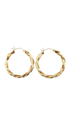 Vintage 14K Yellow Gold Twisted Hoop Earrings This gorgeous set of 14K gold hoop earrings are in a beautiful, twisted design! Diameter: 33.55mm Width: 4.0mm Weight: 4.5 g/ 2.9 dwt Hallmark: JAW 14K Very good condition, professionally polished. Will come packaged in a gift box or pouch (when possible) and will be shipped U.S. Priority Mail Insured. MM121823/17KCS Twisted 14k Yellow Gold Hoop Earrings, Yellow Gold Hoop Earrings With A Modern Twist, Modern Twist Yellow Gold Hoop Earrings, 14k Gold Hoop Earrings With A Modern Twist, Modern Twist 14k Gold Hoop Earrings, Twisted 14k Gold Hoop Earrings, 14k Gold Hoop Earrings, Twisted Hoop Earrings, Earring Ideas