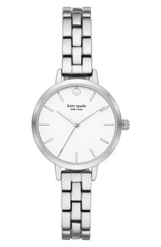 A sophisticated and elegant watch adds a stylish accent for any outfit while also telling the time. 30mm case; 10mm band width Jewelry clasp closure Quartz movement Mineral crystal face Alloy Imported White Face Black Strap Watch, Affordable Silver Watch Accessories With Quartz Movement, Elegant Watch, Silver Watches Women, Jewelry Clasps, Telling Time, Minerals Crystals, Kate Spade New York, Silver Watch