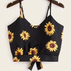 Black And Yellow Sunflower Cropped Cami Top Sunflower Crop Top Spaghetti Strap Machine Wash Or Professional Dry Clean Has A Bow On The Back Medium Used 2 Times And Thoroughly Washed, Almost Brand New Summer Cami Crop Top With Floral Print, Black Floral Print Sleeveless Crop Top, Black Floral Print Cami Tops, Yellow Floral Print Beach Top, Fitted Sunflower Print Top For Summer, Yellow Sunflower Print Top For Summer, Fitted Yellow Tops With Sunflower Print, Sunflower Print Tops For Summer Beach, Sunflower Print Beach Tops For Summer