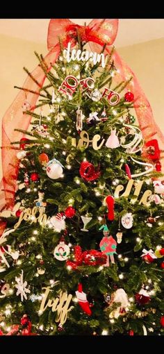 a christmas tree decorated with red and white ornaments