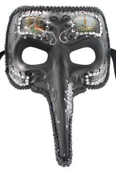 Long nosed carnival mask with glitter and rhinestone details. Black Full Face Carnival Masks, Carnival Eye Mask With Rhinestones, Carnival Rhinestone Eye Mask, Black Full Face Masks For Carnival, Carnival Party Full Face Mask, Full Face Masks For Mardi Gras Party, Full Face Black Masquerade Mask For Costume Party, Mardi Gras Full Face Party Mask, Rhinestone Mask For Carnival Masquerade