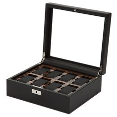 Inspired by the best of British motorcars, Jaguar, Aston Martin, Bristol and the like. Roadster 8 piece watch box wrapped in leather with details of ebony macassar polished wood. SIZE: 10.5" L X 9" W X 3.75" H FEATURES: 8pc watch storage Lock and key security Suspended watch cushions Smart watch USB port Vegan leather Lux Watches, Wood Watch Box, Polished Wood, Watch Winders, Best Of British, Watch Storage, Watch Winder, Modern Watches, Wood Polish