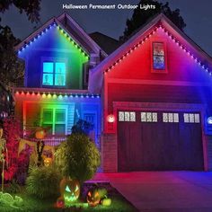 a house decorated for halloween with colorful lights