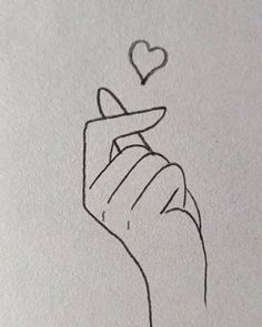 a drawing of a hand holding a heart