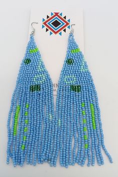 Amazing Turquoise Color Modern Powwow Native American Style Seed Bead Earrings with a variety of native colors in a non-traditional design. Stainless steel ear wires and genuine high quality beads. A beautiful combination of colors and native design at a super price. All handmade. Shipped Free Southwestern Style Blue Earrings For Festivals, Turquoise Beaded Southwestern Earrings, Turquoise Round Bead Earrings For Festival, Turquoise Round Beads Earrings For Festival, Turquoise Beaded Earrings With Dangling Beads For Festivals, Southwestern Style Blue Festival Earrings, Southwestern Turquoise Earrings With Colorful Beads, Traditional Turquoise Beaded Earrings For Festivals, Traditional Turquoise Beaded Earrings