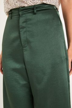 A modern look like the Lulus Sleek Statement Emerald Green Satin High Rise Wide-Leg Trousers is sure to make your look undeniably impressive! Staying chic is easy with these satin pants that feature a high-rise fit, belt loops, and a hidden zipper fly with a top clasp closure. Trendy wide pant legs boast side seam pockets and fall to ankle-length hems. Fit: This garment fits true to size. Length: Ankle length. Size medium Inseam: 29.50 Front Rise: 12.50 Waist: Fitted - very fitted at natural wai Elegant Green Tapered Leg Pants, Satin Trousers, Lulu Fashion, Satin Pants, Wide Pants, Green Satin, Wide Leg Trousers, Hidden Zipper, Ankle Length