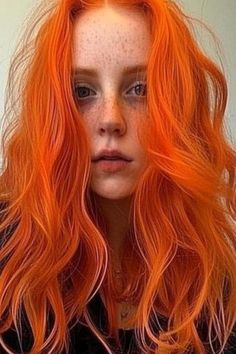 Tangerine is a bold, orange-infused red that radiates warmth and vitality. It pairs beautifully with pale skin, creating a striking, yet harmonious contrast. Click here to check out more best hair colors for pale skin to try. Blonde Shades