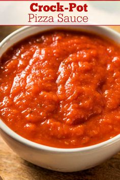 a bowl of crock - pot pizza sauce on a cutting board with text overlay