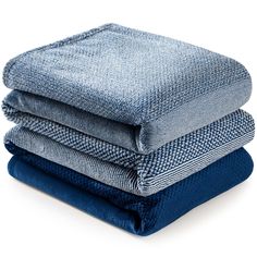 three folded denim sheets stacked on top of each other