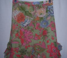 "Vintage Coldwater Creek green, blue and pink English country garden floral flower print pattern print ruffled midi skirt. Good pre-owned condition. No holes, rips, tears, etc. Women's size 1X PLUS. Measurements: waist-34\"-38\", hips-48', length-35\". 100% polyester. Side button and zip closure. Half elastic waist in back. Lined. Gorgeous pattern!" Fitted Green Skirt With Ruffle Hem, Green Skirt For Spring Garden Party, Fitted Green Skirt For Garden Party, Multicolor Ruffle Hem Skirt For Spring, Green Floral Print Tiered Skirt, Fitted Green Floral Print Skirt, Green Floral Print Knee-length Skirt, Flower Print Pattern, Country Floral