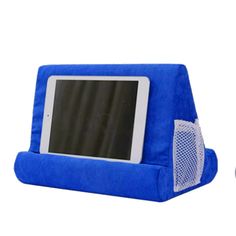 an electronic device sitting on top of a blue case