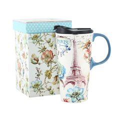 two coffee mugs with the eiffel tower on them