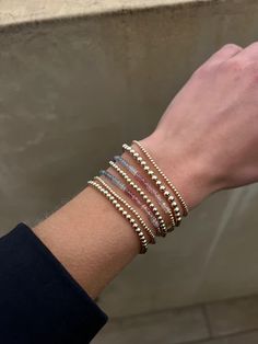 Elevate your everyday wrist stack by adding our signature 14k Gold Filled Beaded Bracelet with Seabreeze Ombre Gemstones to your wrist. Versatile and effortless, our signature ombre bracelets are curated with unique sapphire gemstones and strung on an elastic cord to offer the perfect fit.  DETAILS 2.25" of Sapphire Om Ombre Bracelet, Wrist Stack, Wrist Stacks, Signature Bracelet, Fit Details, Mothers Day Presents, Sapphire Gemstone, Roll On, On Off