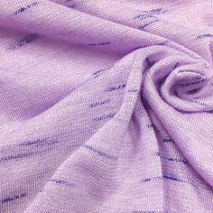 a close up view of a purple fabric with small blue lines on the top and bottom