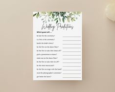 a printable wedding wishes card with greenery on it next to a white flower