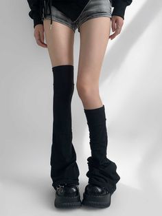 Elevate your style with these stunning black leg warmers. Measuring 68cm in length, the pure black color adds a versatile and timeless appeal, making them perfect for any outfit. The flared design offers a unique and fashionable flair. Garment Size SizeFree SizeFull Length68Cuff27/56 Black Fitted Punk Bottoms, Fitted Black Punk Bottoms, Trendy Black Cotton Knee-high Socks, Alternative Style Black Stretch Bottoms, Alternative Black Stretch Bottoms, Alternative Style Stretch Black Bottoms, Gothic Fitted Bottoms For Fall, Gothic Black Flare Bottoms, Fitted Gothic Bottoms For Fall