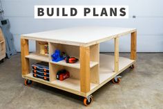 a workbench with various tools on it in a garage