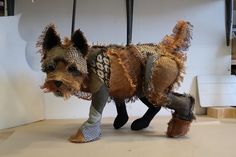 an animal made out of clothes and shoes