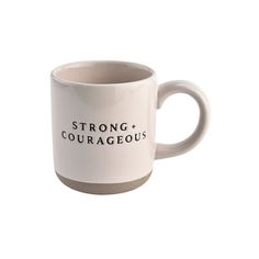 a coffee mug with the words strong courageous on it