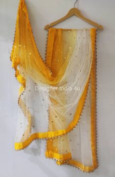 This is a Dupatta made on orders. It is made using net fabric with gold sequinces embroidery all over. We make it colored as shown in the picture. Then we stitch a beautiful golden lace to all sides of it. Dupatta is having a length of 100 inches and width of around 40 inches. I don't keep it readymade I only make it exclusively for my customers. Can be fully customised. Duppattas Designs Ideas, Mint Outfit, Party Wear For Women, Bridal Lehenga Designs, Floral Frocks, Suit Salwar, Lehenga Suit, Girls Party Wear, Golden Lace