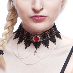 This choker combines the elegance of black venise lace with a beautifully ornate Ruby red pendant (26 x 22 mm), draped chains and a small central cross (20 x 10 mm).  The lace is finished off securely with an extender chain which allows the necklace/choker to be worn at any size from 13 to 15.5 inches. With the addition of an extender chain you can be sure of getting the fit you want and can choose between wearing the choker higher or lower on the neck.  This item can be made larger or smaller if required at no extra cost.  The Lucretia venise lace choker is available in Black Onyx, Sapphire blue, Emerald green, Deep purple and Ruby red.  There are three photos of the Emerald green Lucretia being worn. Gift wrapping All jewellery is beautifully presented and ready for gift giving, sprinkle Gothic Chain Choker, Gothic Halloween Clavicle Chain Necklace, Red Punk Choker For Festivals, Gothic Clavicle Chain Necklace For Halloween, Gothic Chain Choker For Party, Steampunk Black Necklace For Halloween, Red Metal Choker For Party, Steampunk Jewelry For Halloween Festival, Red Punk Choker As Gift