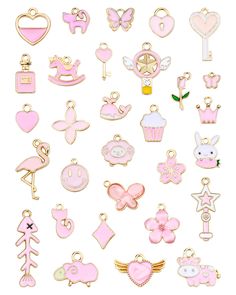 various pink and gold charms on a white background