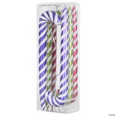 three colorful striped paper straws in a package