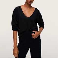 Fine Knit Fabric. Cashmere Blend Fabric. Straight Design. V-Neck. Long Sleeve. Cable Knit Finish. Bust Is 18 Inches, Length Is 24 Inches. Composition: 39% Viscose,36% Polyester,19% Polyamide,6% Cashmere Black V-neck Top For Workwear In Fall, Black V-neck Top For Fall Workwear, Fine Knit V-neck Top For Work, Chic V-neck Fine Knit Sweater, Elegant Knit V-neck Top, Chic Stretch V-neck Sweater, Chic V-neck Stretch Sweater, Elegant V-neck Knit Top, Black Fine Knit V-neck Top