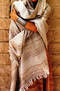 ❂ Very large & beautiful Shawl in natural color made from Hand Spun & Handwoven Wild Silk and Wool ❂ ⫸⫸ SIZE ⫸⫸ about 203 cm X 102 cm // 80" X 40" ⫸⫸ MATERIALS ⫸⫸ Hand Spun & Handwoven Wild Silk and Wool ⫸⫸ COLOR ⫸⫸ Natural Color ❀ Please note that colors of handwoven fabrics are unique and may vary a bit . We embrace this quality, as just like you and me - even the fiber will be who they want to be! ❀ We focus on natural materials and aim to support traditional crafts and ancient skills ~ striving to go deeper to the source of all materials Our vision is to be able to connect with each being involved in the making from the very source, Being able to Source the most ethical, fair trade, Eco and conscious materials  🙏 Caring 🙏 Handmade fabrics are best washed by hand or cold cycle with an Handwoven Fabric, Yarn Sizes, Wool Shawl, Natural Silk, Traditional Crafts, The Source, Hand Spinning, Shawls And Wraps, Wool Yarn