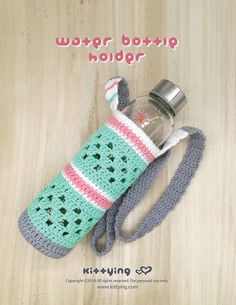 a crocheted water bottle holder on a wooden table