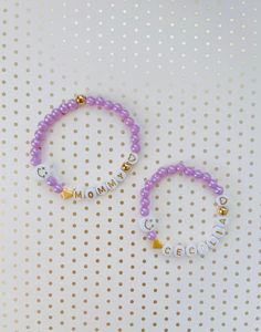 "This dainty MOMMY & DAUGHTER matching bracelet set is the cutest accessory ever! It is the best way to show off the ❤️love between you and your little girl! Each bracelet comes with a 24K heart bead and 24k gold beads AND a happy 😄 face bead to tell everyone how lucky you are to be a mom! Of course, you can have any names/words on the bracelets! 💝Add an extra charm or 2 for a low price of $1 each - https://etsy.me/36LE9om 💗We offer gift wrapping option with a nice jewelry box and make th First Day Of School Bracelet, Mini Bracelet, Mommy And Baby, Nice Jewelry, Daughter Jewelry, Moms Bracelet, Baby Bracelet, Mom And Daughter, Baby Jewelry