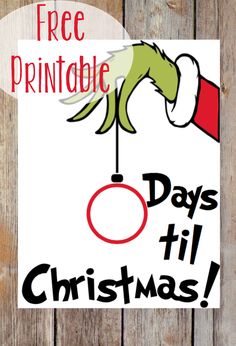 a sign that says free printable days til christmas with an elf's hat on it