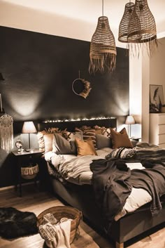 a large bed sitting inside of a bedroom next to two lamps