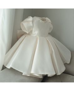 Couture Ivory Satin Ruffled Jeweled Neckline Flower Girl Dress with Short Sleeves Wholesale #TG8048 - GemGrace.com Fitted Princess Dress With Ruffles And Short Sleeves, Elegant Satin Princess Dress For Pageant, Satin Short Sleeve Dress With Ruffles, Elegant Short Sleeve Princess Dress For Party, Short Sleeve Satin Dress With Ruffles, Elegant Princess Dress With Ruffles For First Communion, Elegant Ruffled Pageant Dress, Elegant Short Sleeve Princess Dress For Dress-up, Elegant Satin Baptism Dress For Party