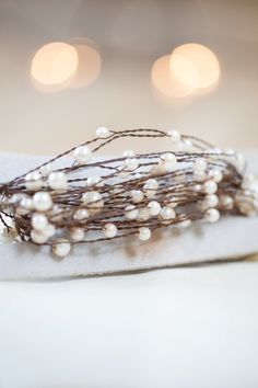 a bunch of white pearls on top of a napkin